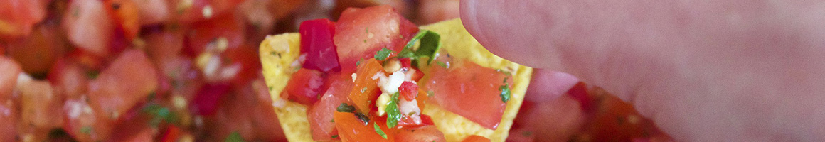Eating Mexican at La cevicheria by de Mole restaurant in Astoria, NY.